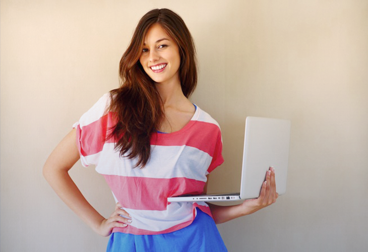 Student's writing on laptop