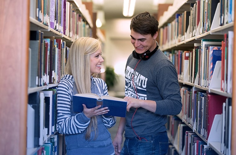 Students read book